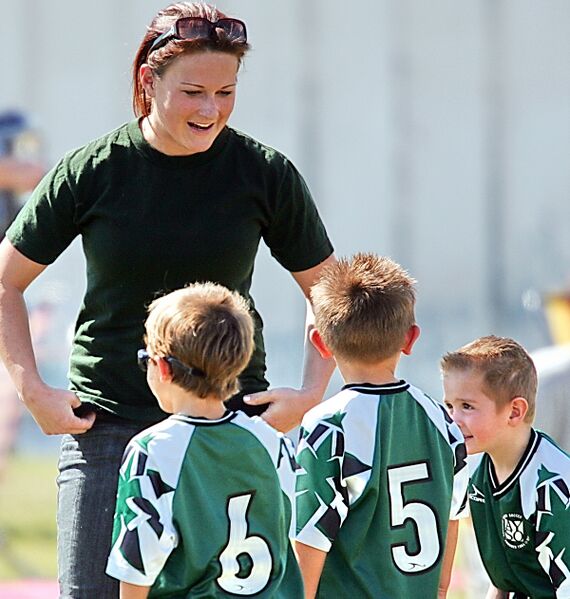 File:Coach and three kids.jpg